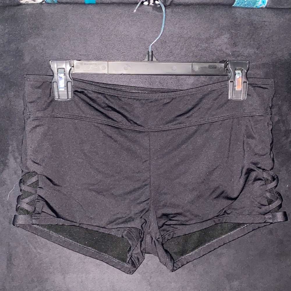 Black swim shorts criss cross side detailing